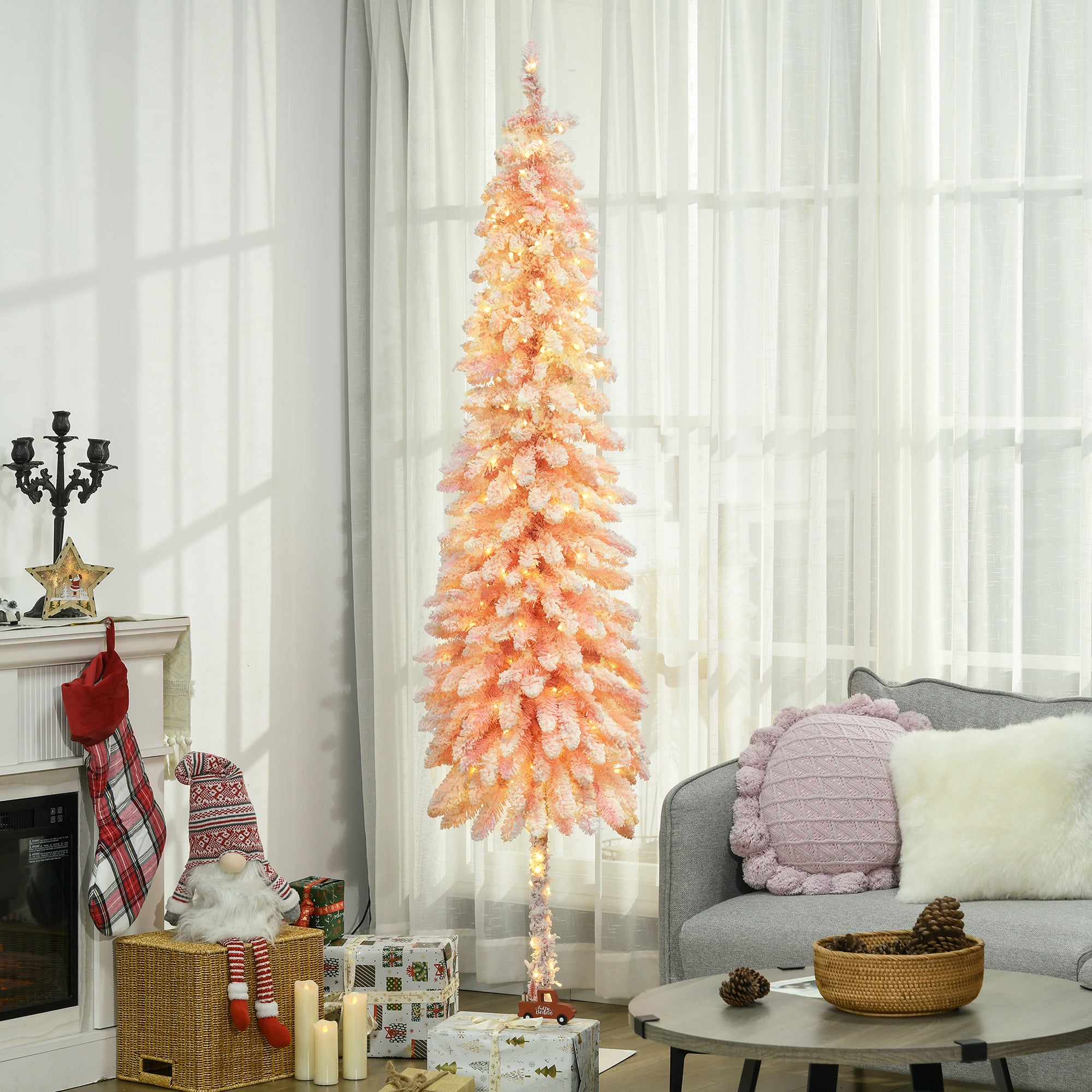 7ft pink Christmas tree as a second tree in a home entryway