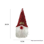 Brown gingerbread man fabric Christmas pendant on white background, holiday ornament with warm charm