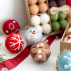 Wool felt balls with snowflake design for holiday faith decor