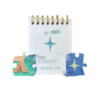 Finding God ornament hanging among other Christmas decorations on a tree, holiday faith decor