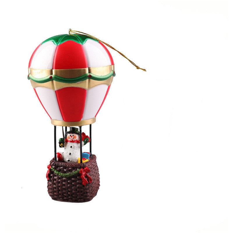 Christmas snowman ornament featuring hot air balloon snowman design