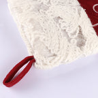 Christmas sock pendant featuring intricate snowflake embroidery in rich velvet