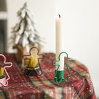Green gingerbread man candlestick holder for holiday display