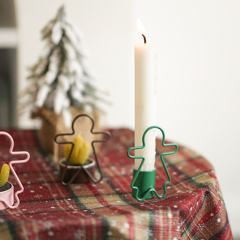 Green gingerbread man candlestick holder for holiday display