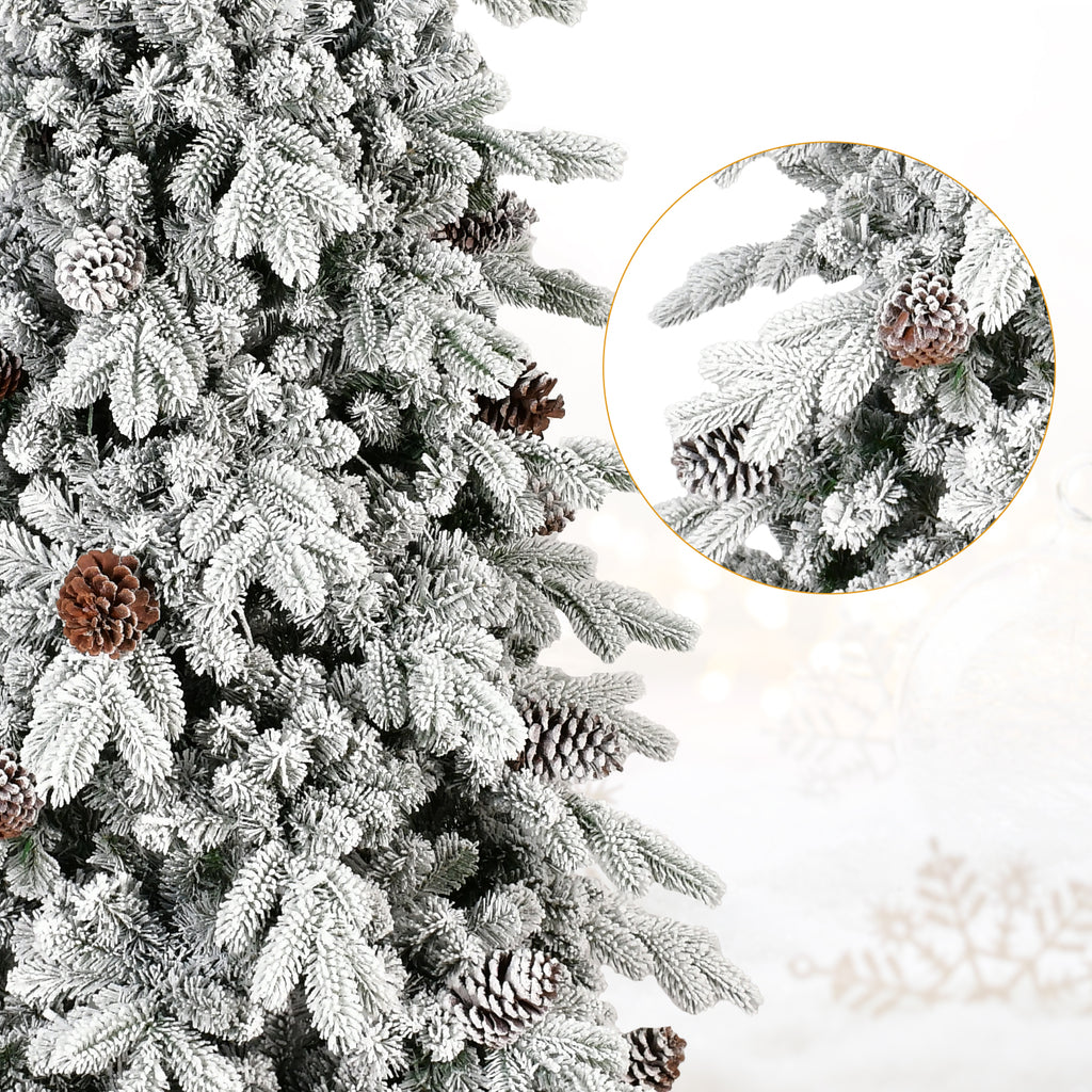 Fully decorated flocked Christmas tree with ornaments and lights