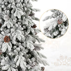 Fully decorated flocked Christmas tree with ornaments and lights
