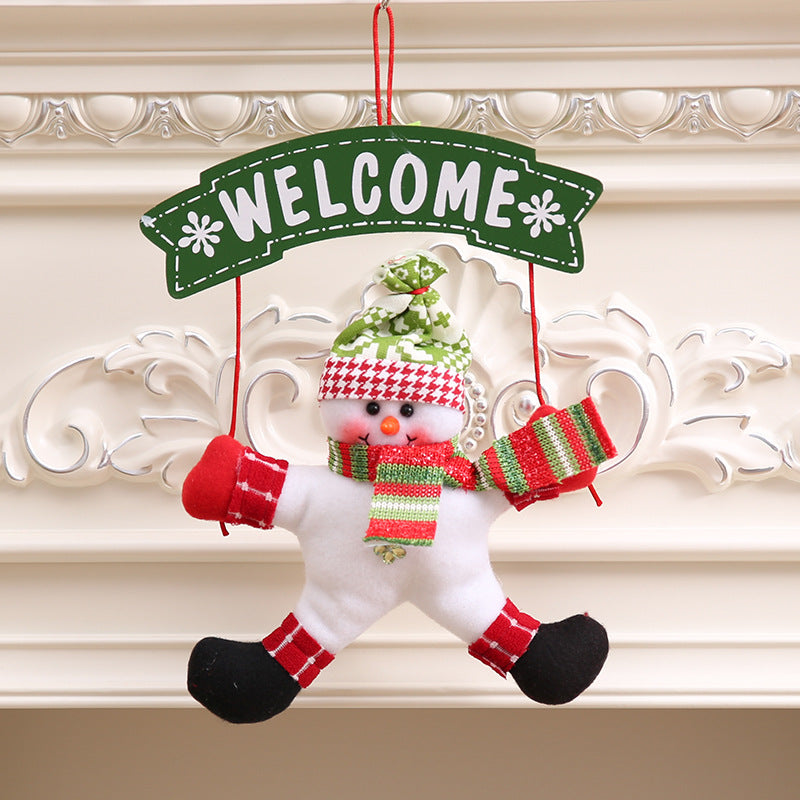 Close-up of Christmas cloth door hanger showing red and white fabric design detail