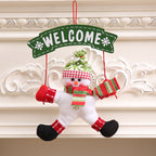 Close-up of Christmas cloth door hanger showing red and white fabric design detail