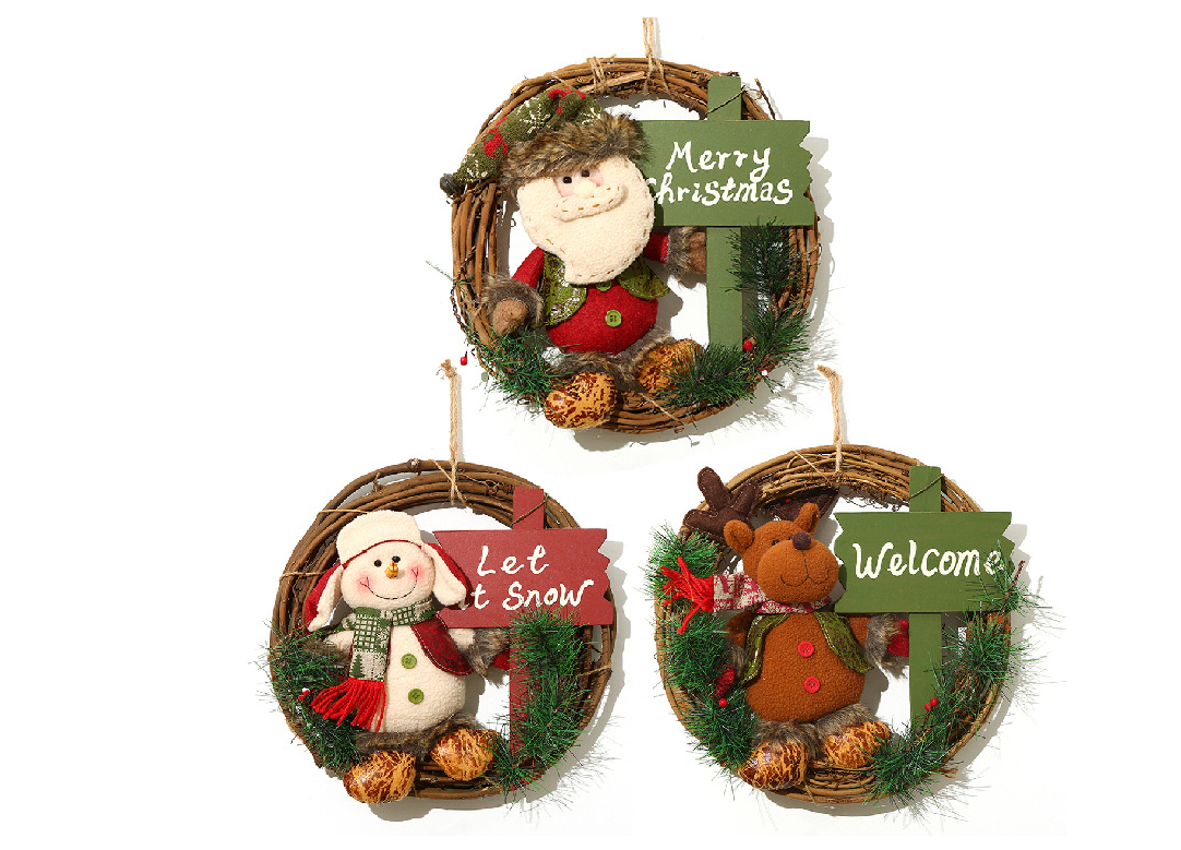 Festive Christmas wreath with plush doll greeting guests on front door Main image