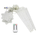 Warm white snowflake decorative lights arranged on dark background