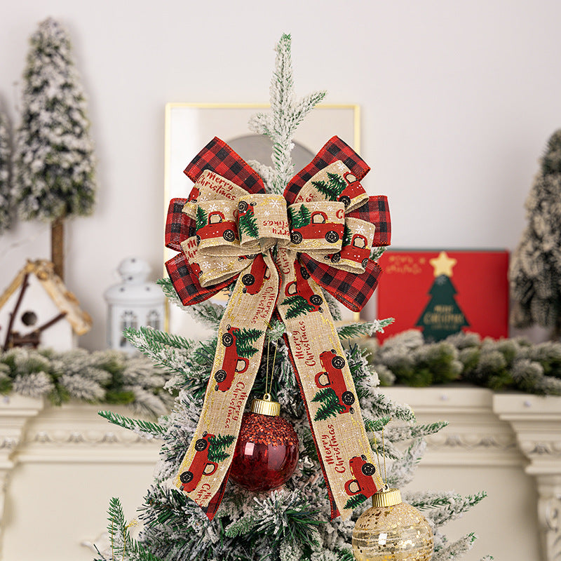 Holiday cloth ornament featuring festive bowknot style