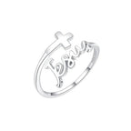 White gold and gun black cross Jesus rings displayed together