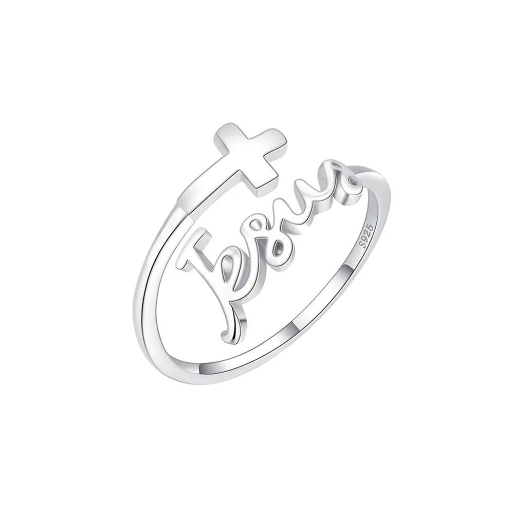 White gold and gun black cross Jesus rings displayed together