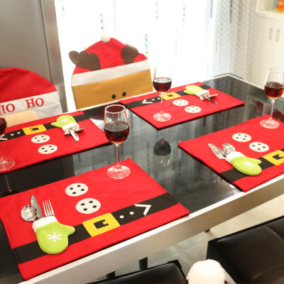 Holiday table setting featuring Christmas table mat