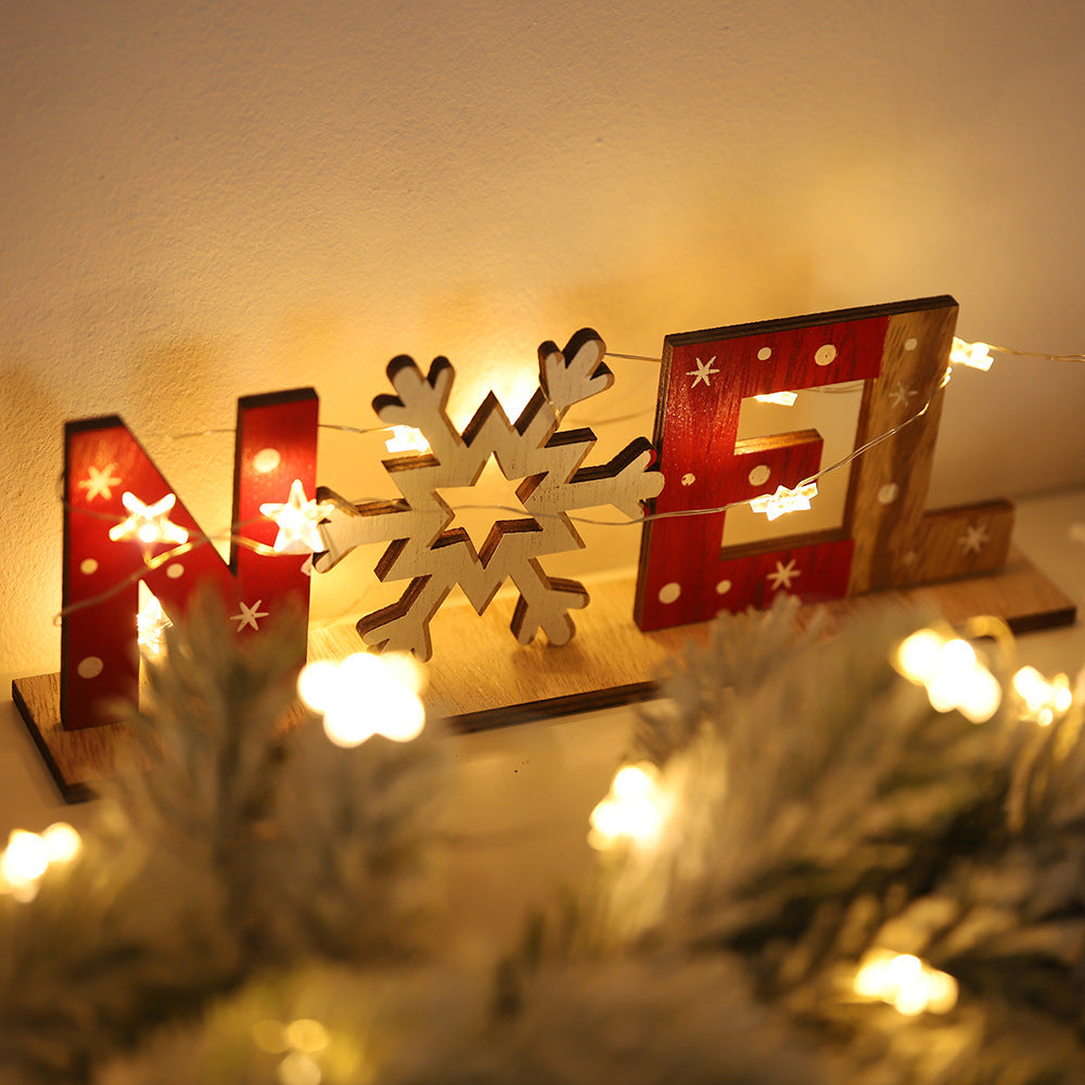 Wooden Christmas ornament with creative festive design featuring nativity imagery and holiday faith symbolism