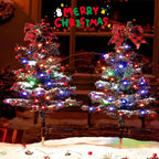 Close-up of glowing Christmas tree stake light showing intricate light patterns through green foliage