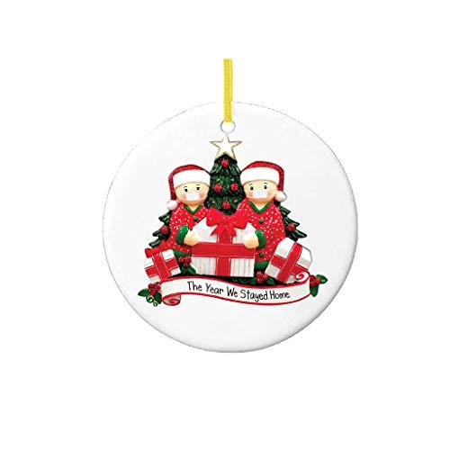 Ornament pendant displayed on tree branch with pine cones and ribbon