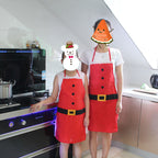Red Christmas apron folded and styled for gifting presentation