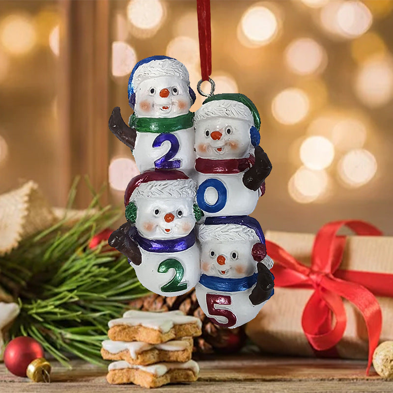 Holiday decorated scene with snowman pendants