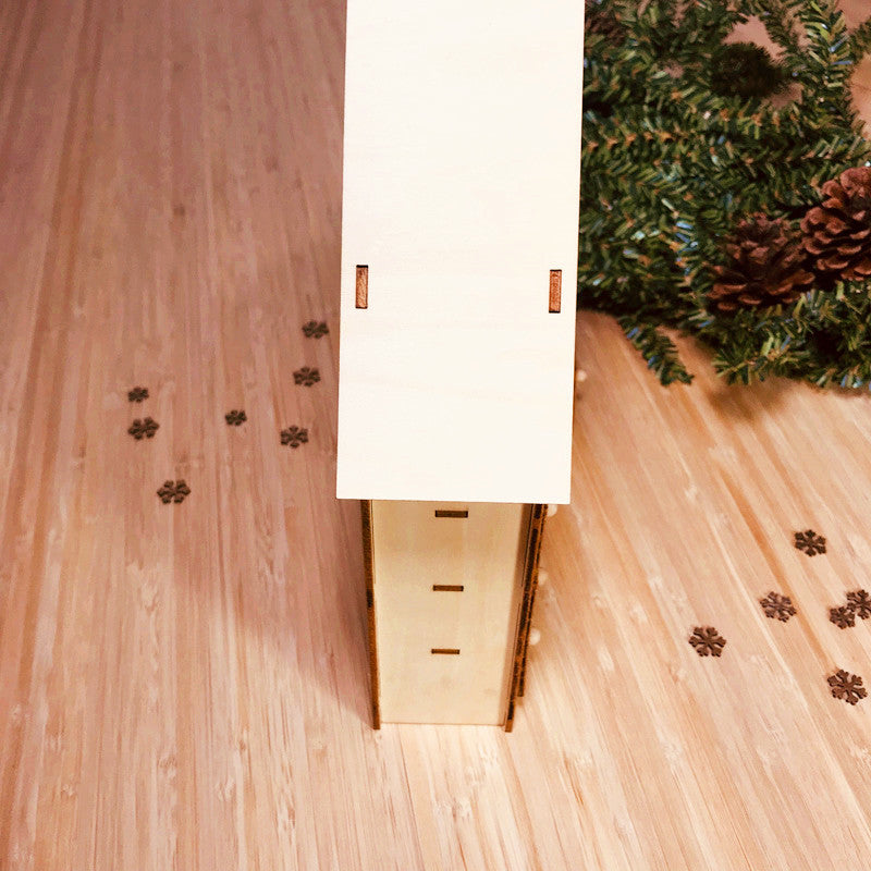 Detailed view of wooden advent calendar compartments for countdown to Christmas
