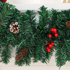 Rattan pine cone bow Christmas piece with soft warm lighting highlighting the holiday arrangement