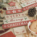 Close-up of wooden Christmas wall decoration with blessing text