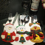 Charming Christmas utensil organizer bag featuring cozy winter character for festive holiday entertaining