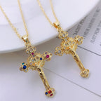 Front view of gold-tone oversized cross pendant necklace on mannequin