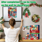 Christmas puzzle advent calendar with 24 small cardboard models arranged in a holiday setting