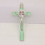 Luminous green St. Benedict's cross pendant with Jesus icon for Catholic devotion