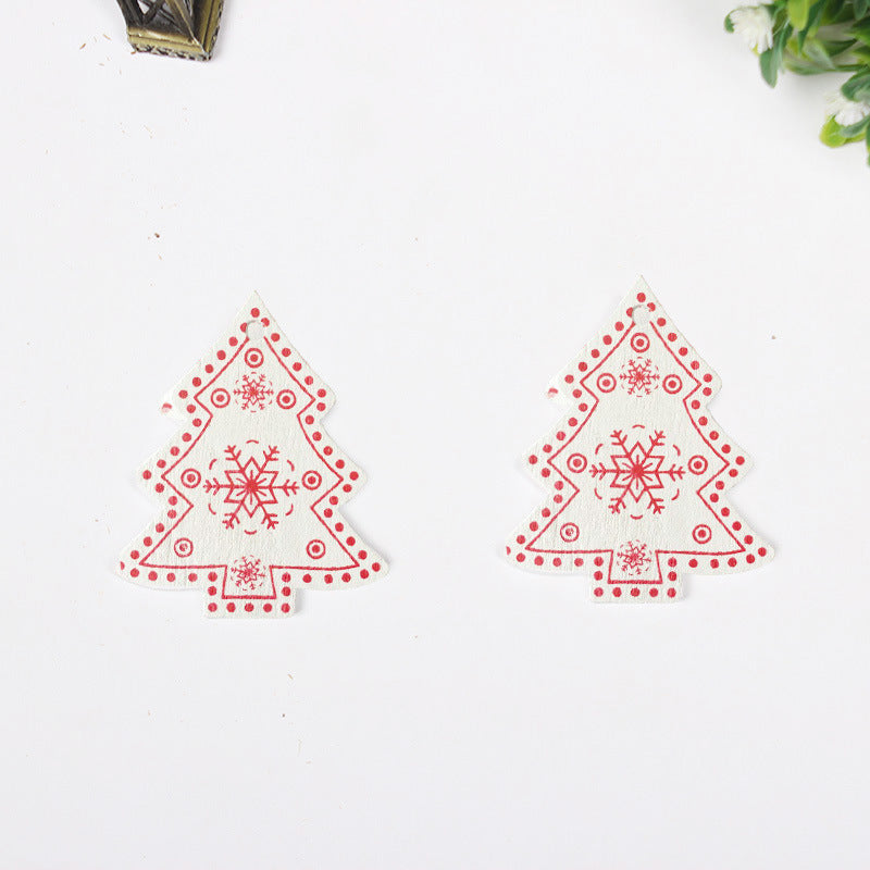 Set of colorful wooden Christmas ornaments with holiday motifs for festive home decorating Main image
