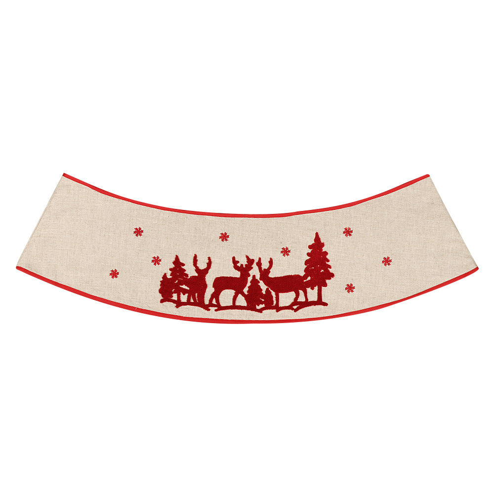 Christmas tree skirt with elk design in linen fabric displayed decoratively