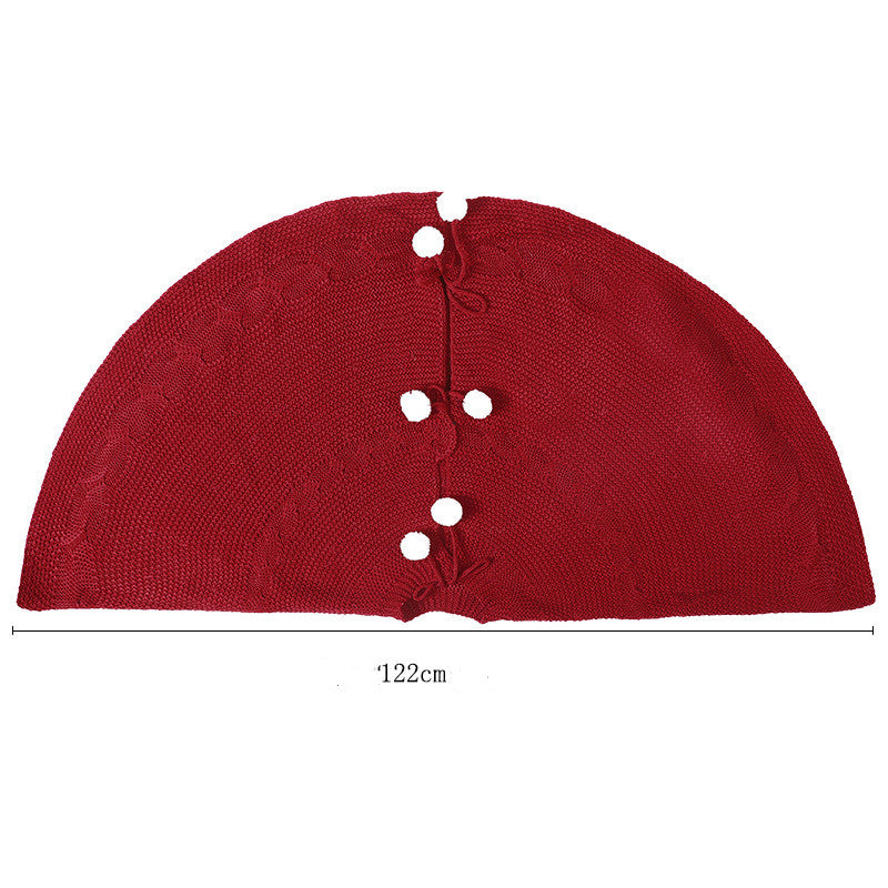 Festive wine red tree skirt decoration adding warmth to the holiday season