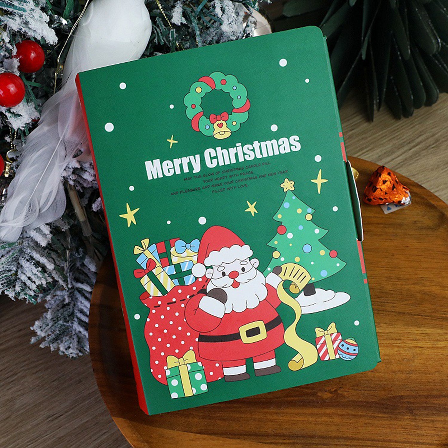 Green paper storybook boxes for holiday gift packaging
