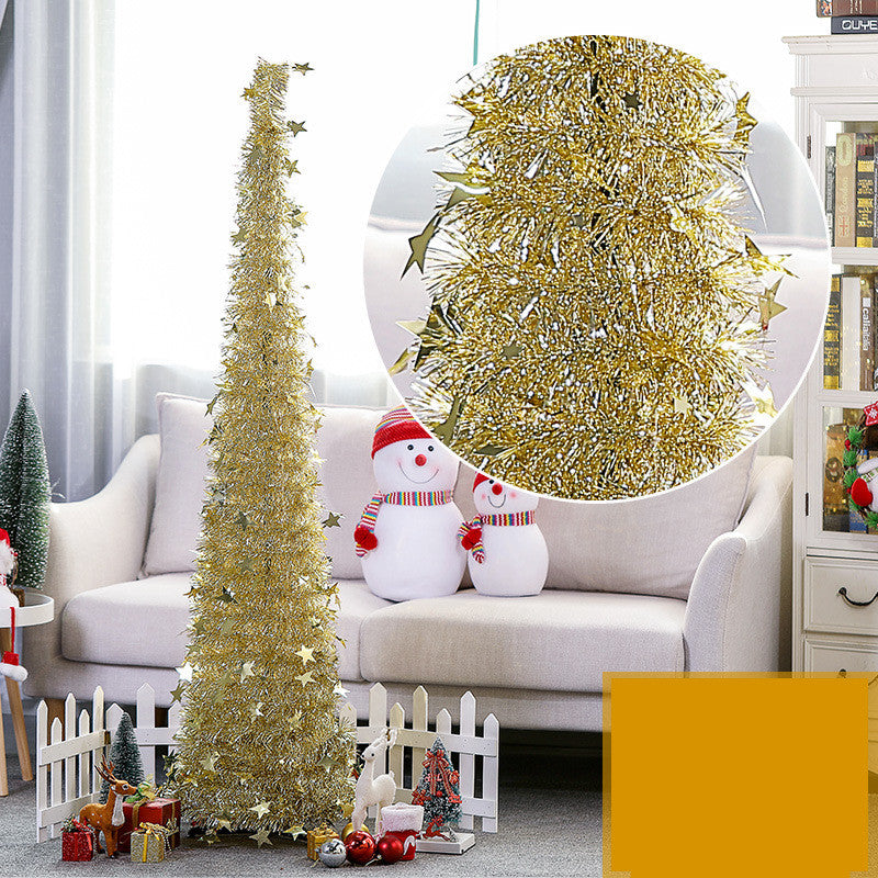 Green Christmas garland with ornament accents for festive wall display
