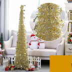 Green Christmas garland with ornament accents for festive wall display