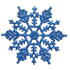 Close-up of intricate snowflake design on acrylic hanger