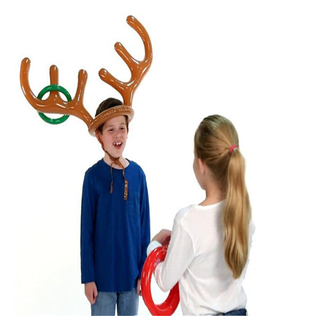 Christmas ring toss game featuring green and red throwing rings