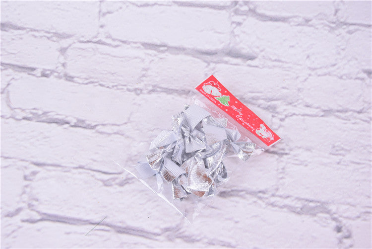Christmas gift wrapping with red bow accent - Simple Christmas Bow