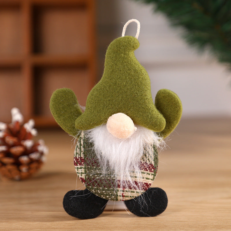 Cozy holiday scene with Santa fabric doll decoration displayed