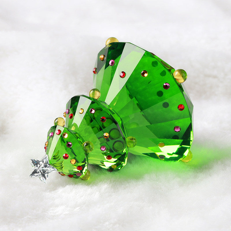 Crystal ornament featuring elegant tree silhouette design