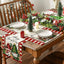 Nordic Christmas linen placemat on a festive table setting with warm holiday decorations