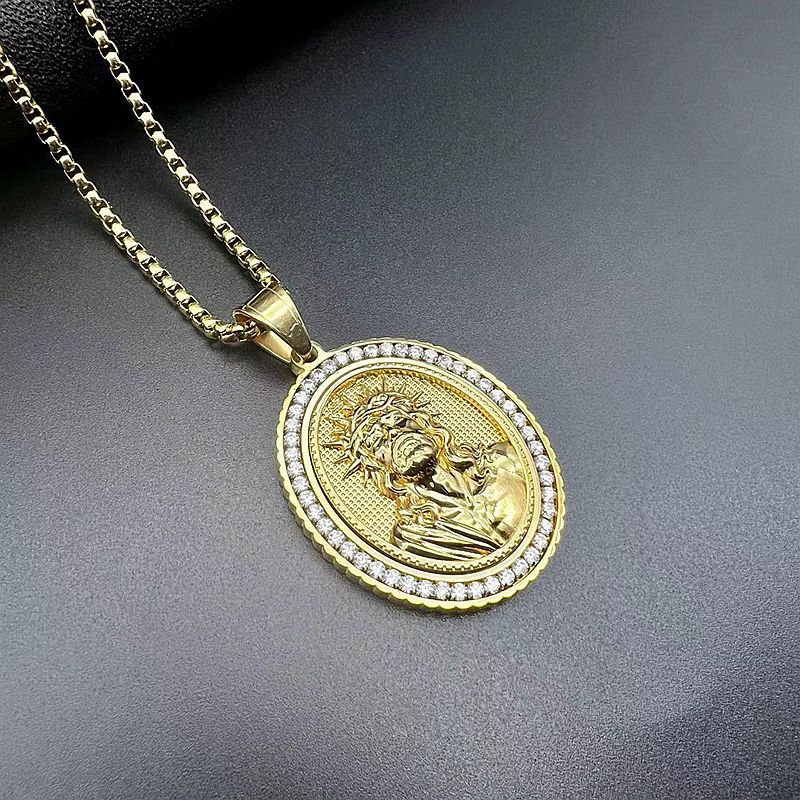 Close-up of geometric Jesus pendant with zircon accents
