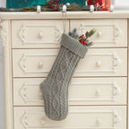 Set of colorful Christmas stockings in red green white variations for tree decorations