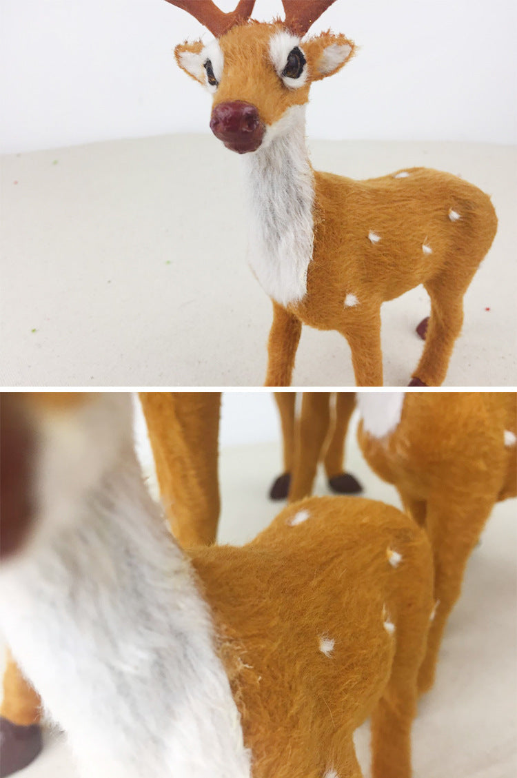Three flocked deer ornaments displayed together in a festive holiday setting