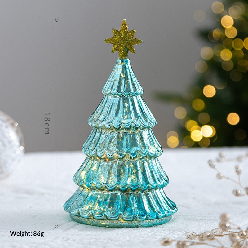 Five-pointed star ornament in green glass with elegant faceted detail for Christmas