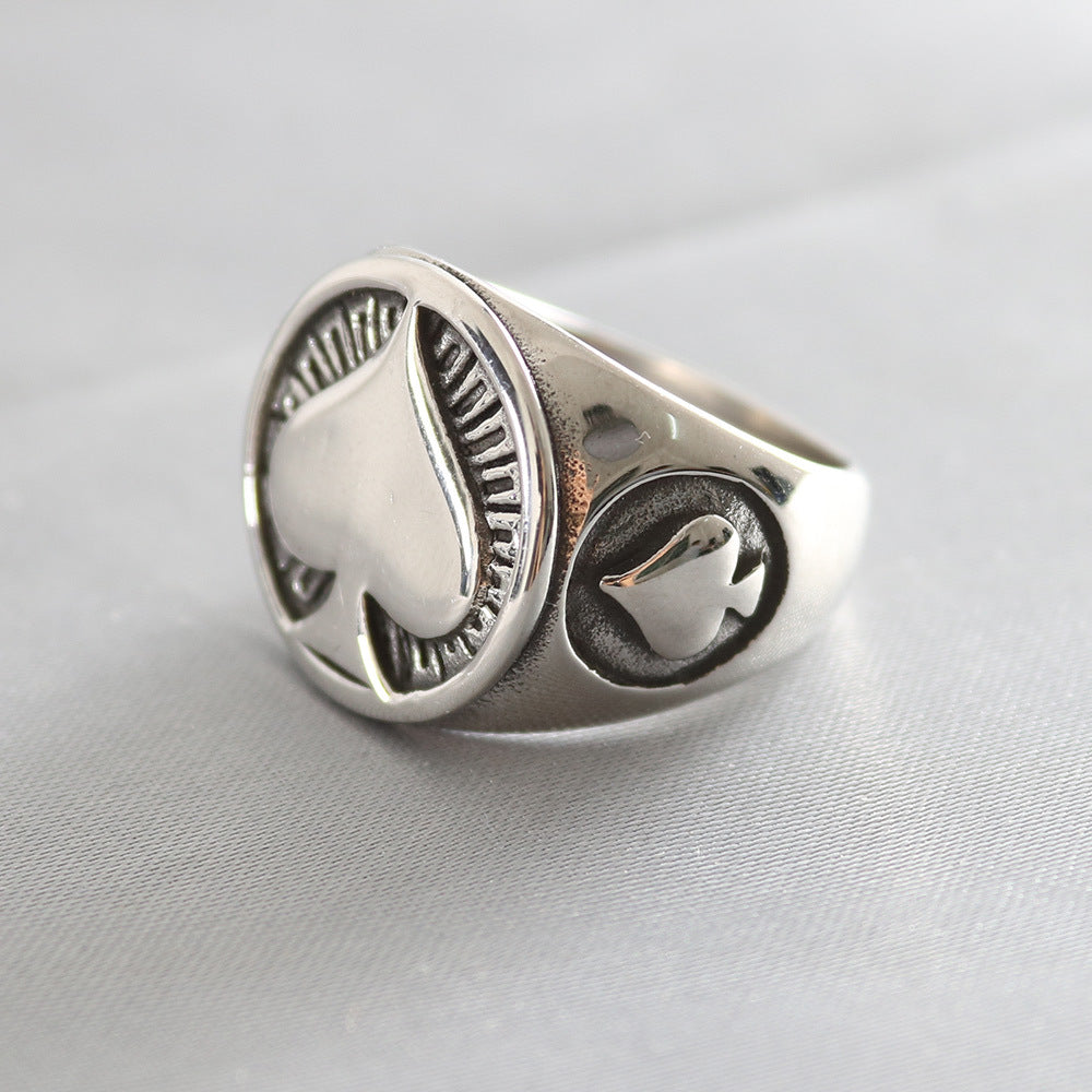 Religious ring featuring geometric cross and Sacred Heart symbolism