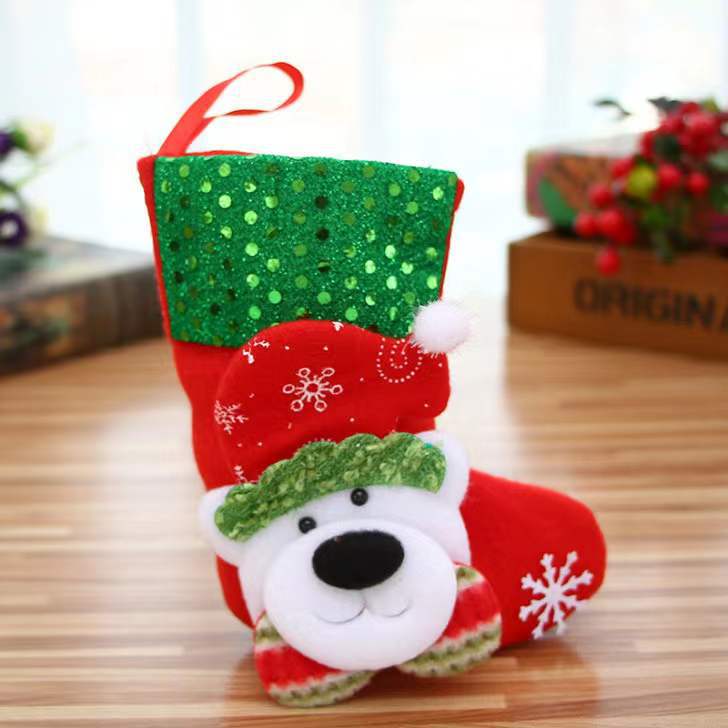 Close-up of detailed sequin Christmas stocking ornament for tree display