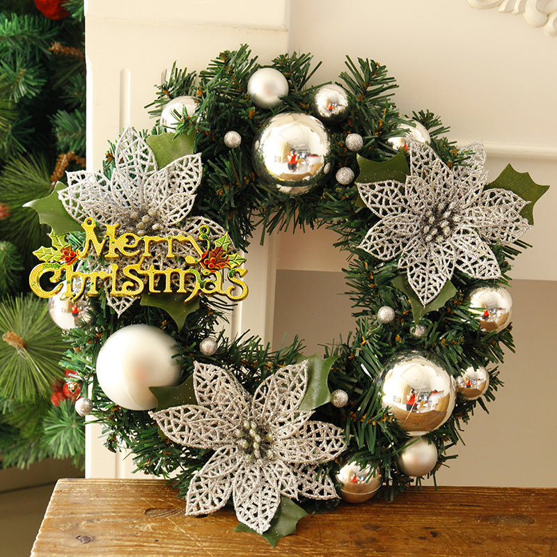 Christmas wreath displayed on door for holiday welcoming decoration
