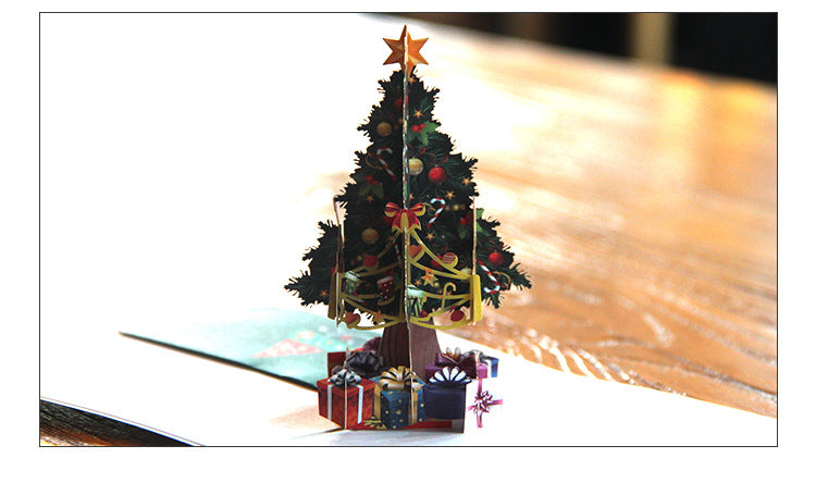 Color-printed fold card showing festive Christmas tree design